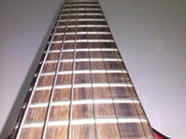 A semi-acoustic guitar fretboard